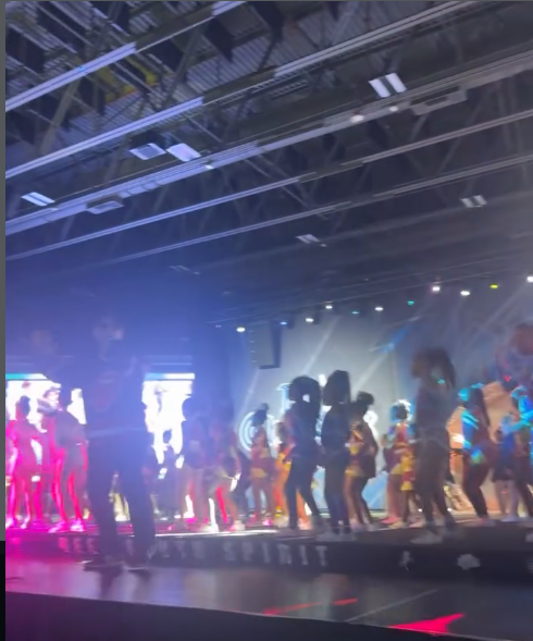 The Diamond Eagles performing their routine under bright stage lights